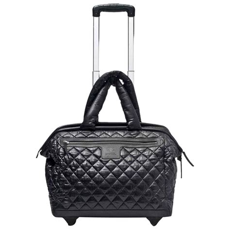 travel bag chanel|chanel travel bag with wheels.